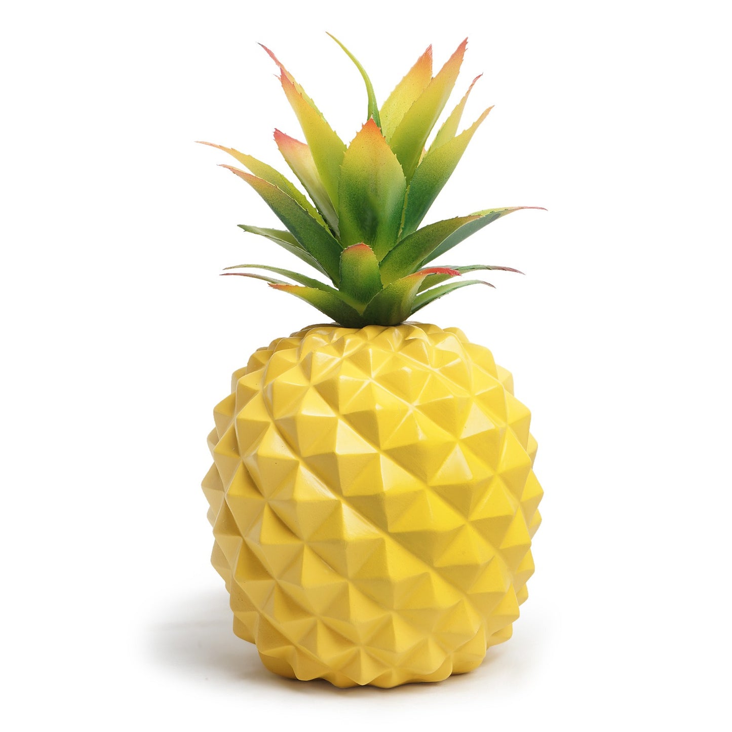 Yellow pineapple plant and green plant office desk decoration